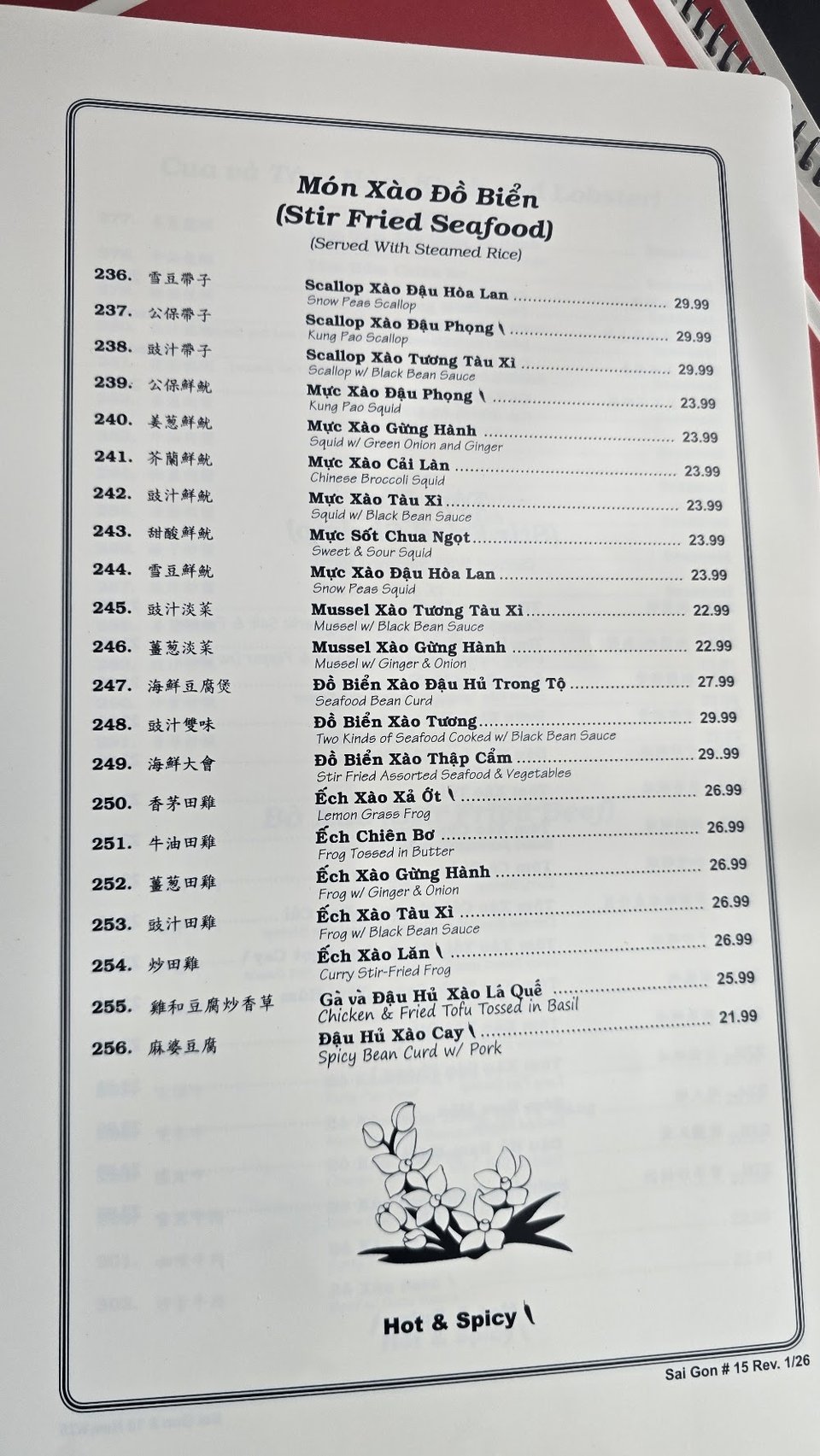 Printed menu with noodle soups and small plates.